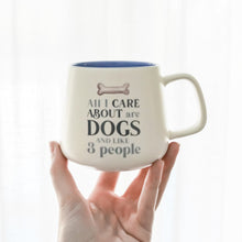 Load image into Gallery viewer, ALL I CARE ABOUT ARE DOGS MUG