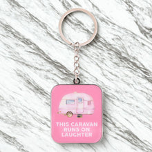 Load image into Gallery viewer, KEYCHAIN THIS CARAVAN RUNS ON LAUGHTER